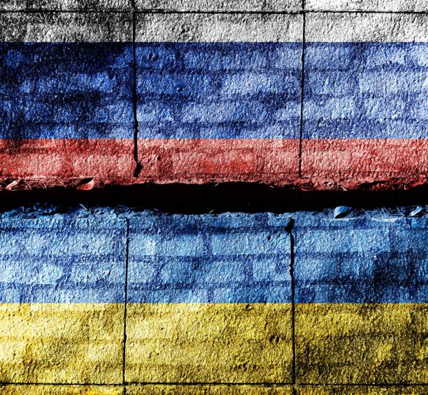 istock Russian flag and Ukrainian flag 1392905554