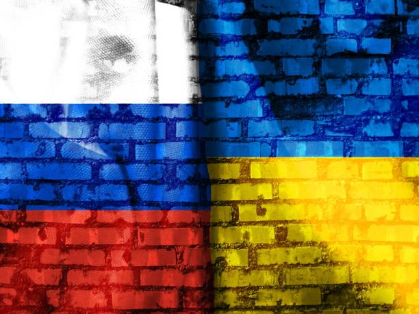 istock Russian flag and Ukrainian flag 1392905962