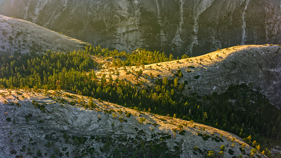Aerial view of early morning sun shining on Yosemite Valley, California, USA.