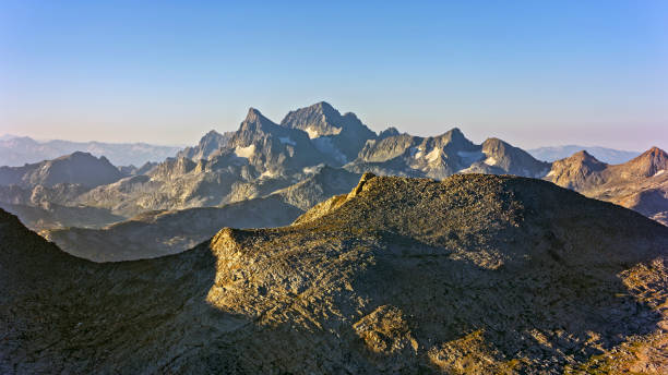 Aerial view of high mountain peaks in Yosemite National Park on sunny day, California, USA.