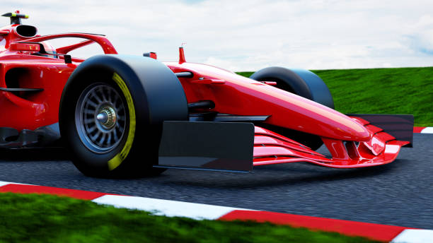 istock red race car driving on a race track 1392909736