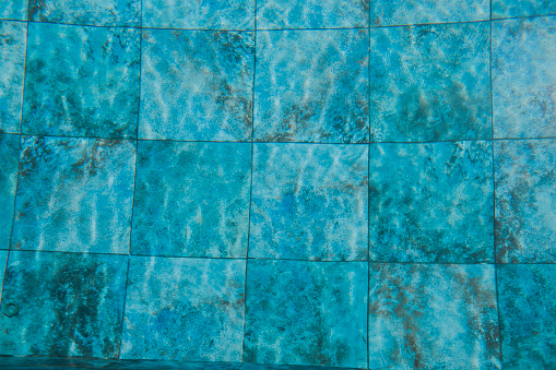 Close-up shot at the bottom of the pool.