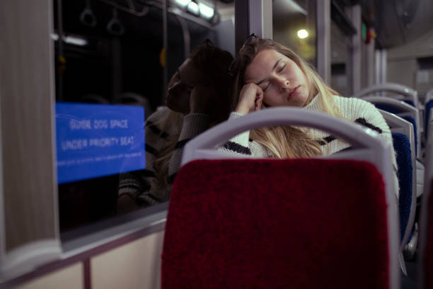 istock After the third shift, the woman returns home by subway. 1392911370