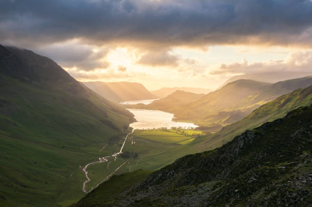 istock Dramatic light shining down onto Buttermere in the Lake District 1392914228