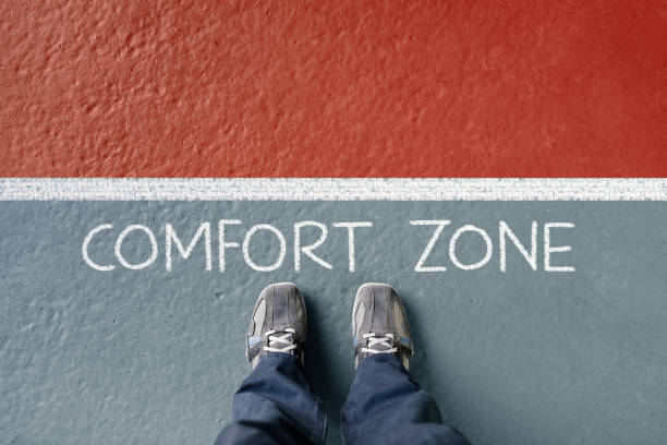 Man standing in his comfort zone missing out on opportunity Man standing in his comfort zone missing out on opportunity concept for motivation, opportunity and possitive attitude courage stock pictures, royalty-free photos & images