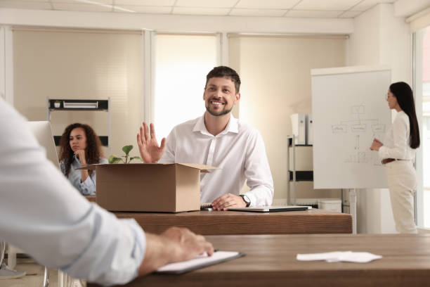 istock New coworker greeting employee in modern office 1392918695