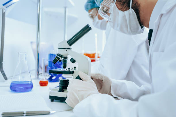 istock close up. a group of scientists working on creating a new vaccine 1392920179