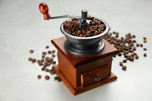 Close-up ground coffee beans at coffee shop.