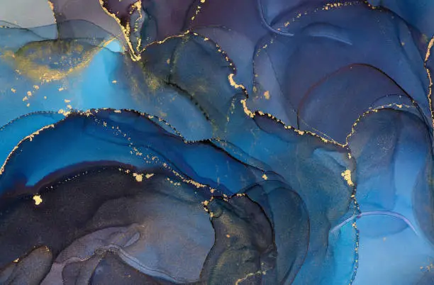 Currents of translucent hues, snaking metallic swirls, and foamy sprays of color shape the landscape of these free-flowing textures. Natural luxury abstract fluid art painting in alcohol ink technique