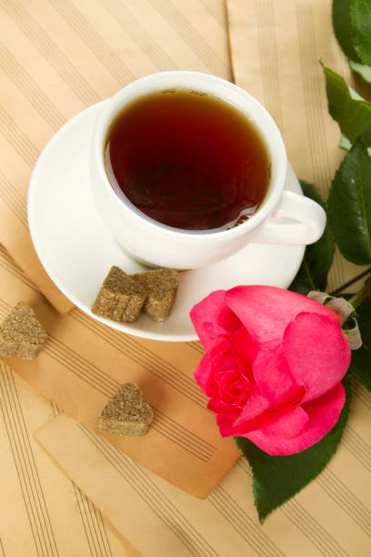 istock A cup of tea and rose 1392924085