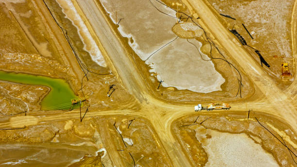 istock Truck driving on Lithium mine 1392927146