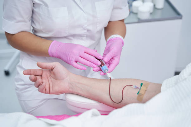 istock Competent cosmetologist preparing her patient for procedure 1392928099