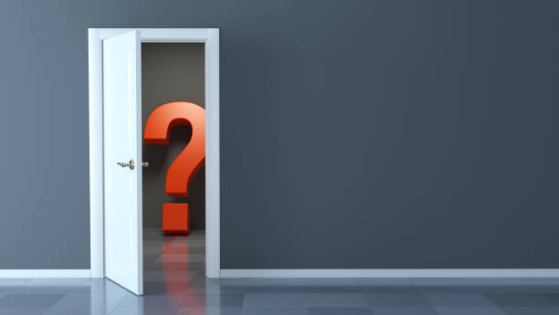 istock Red question mark behind the door ajar and empty wall - 3d rendering 1392939190
