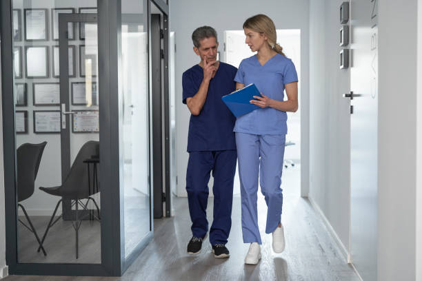 istock Two caucasian doctors analyzing medical exams 1392945390