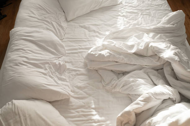 istock white bed background, after sleep, dirty bed 1392952906