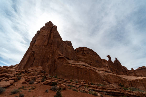 Arches National Park at Midday - Arches has many arches including the famous Delicate Arch, the Window Arch, the Double Arch and other features such as Tower of Babel, Turret Arch, and the Courthouse Towers