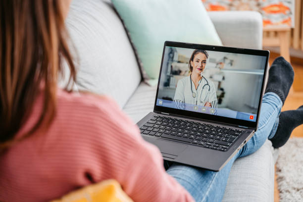 istock Young Woman Having A Doctor's Appointment Online 1392969919