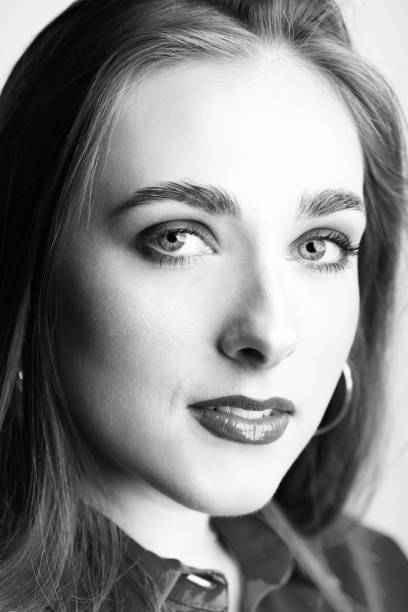 istock Beautiful woman with make-up close-up studio portrait 1392980449
