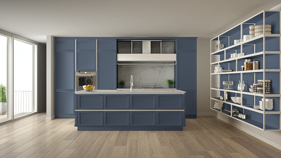 Classic blue kitchen in modern open space with parquet floor and big panoramic window with balcony, island and accessories, minimalist contemporary interior design