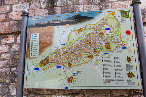 Map of the city of Assisi placed at the entrance to the city. Map with all the monuments and churches.