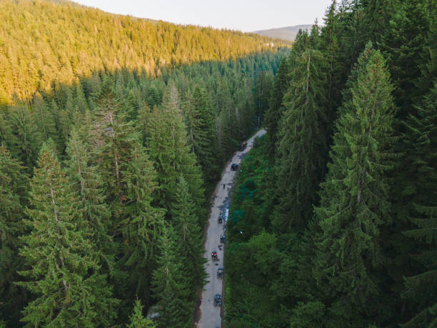 istock people riding atv at ukrainian carpathian mountains 1392988706