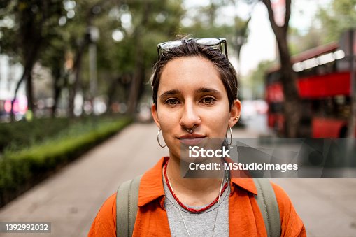 istock Close up portrait of young woman 1392992032