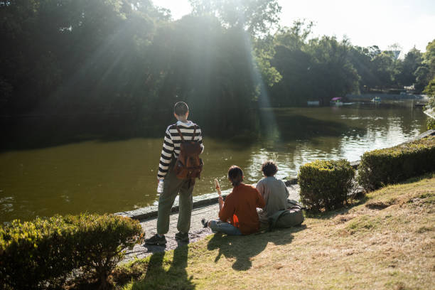istock Friends enjoying next to river 1392992367