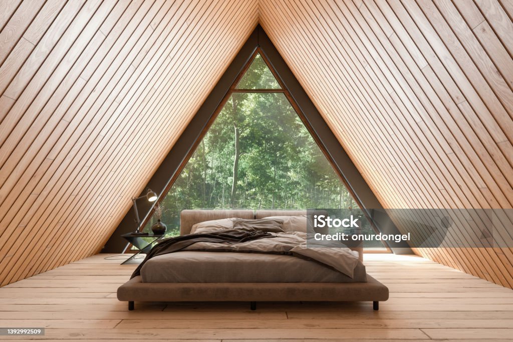 Wooden Tiny House Interior With Bed Furniture And Triangular Window. Hotel Stock Photo