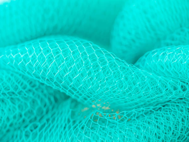 Abstract background of turquoise color mesh for grid pattern, rough and layer texture stock photo