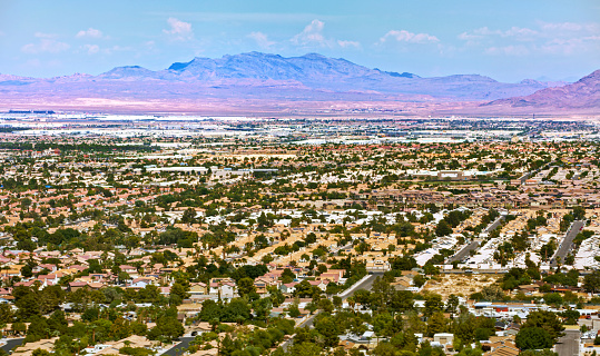 Aerial view of residential district with mountain in background against sky, Nevada, California, USA.