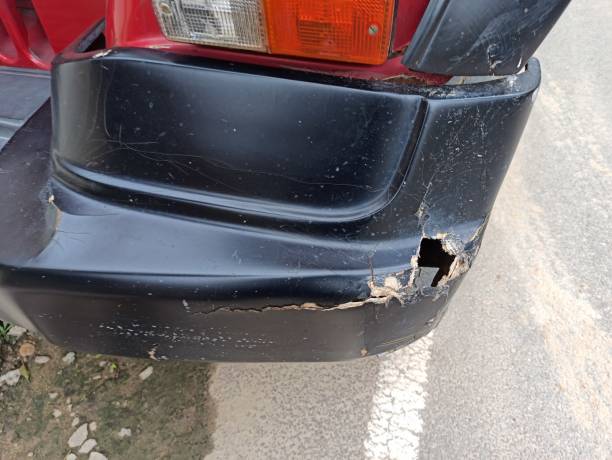 istock Car damage bumper, bumper damage of black car 1393004308