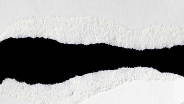 istock a white piece of paper on a black isolated background 1393004367