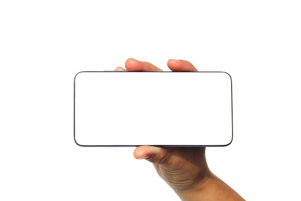 istock A woman's hand holds a cell phone on a white background. 1393009590