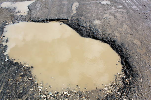 8,200+ Mud Holes Stock Photos, Pictures & Royalty-Free Images - iStock