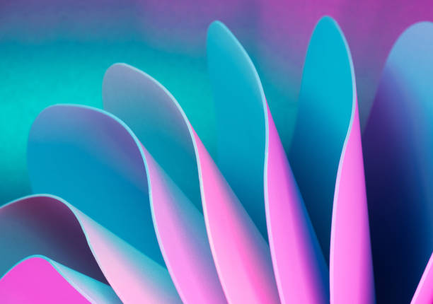 istock Pink and teal dynamic sheets with neon led illumination. 1393012413