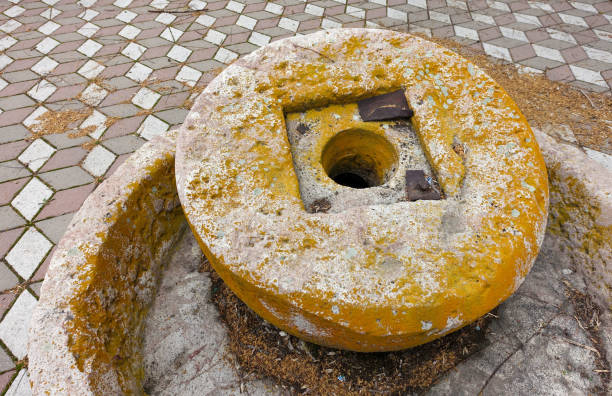 man-made classical millstone,old seten and millstone,seten-millstone exhibited in the park,