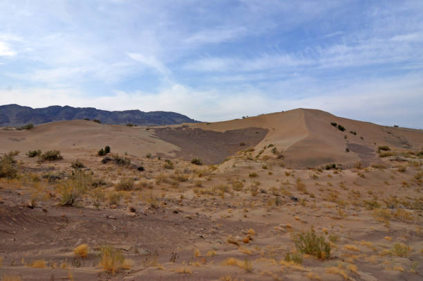 istock Kazakhstan.The Singing Dunes (also known as Singing Barchan). 1393014512