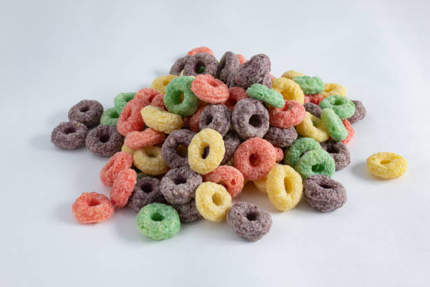 istock Portion of colorful fruit breakfast cereal, without milk, on white background 1393014927
