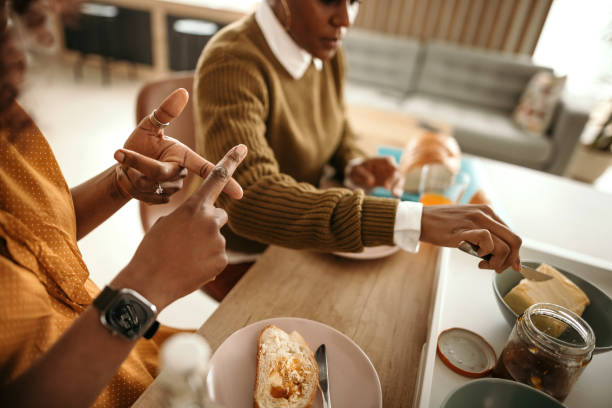 istock Women eating breakfast together 1393016108