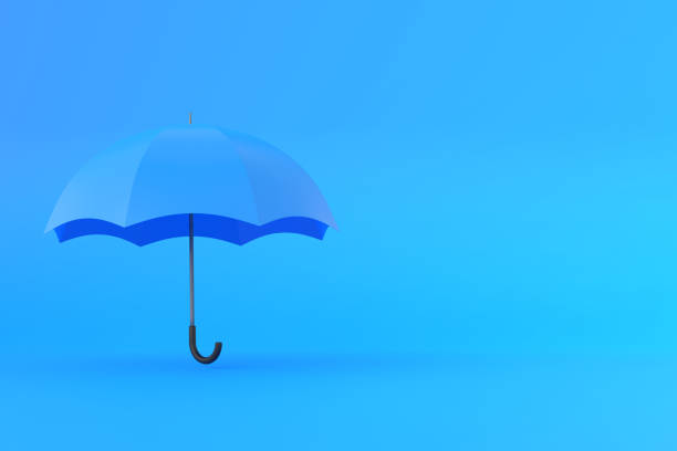 istock Blue umbrella on a blue background. Minimal creative concept 1393016974