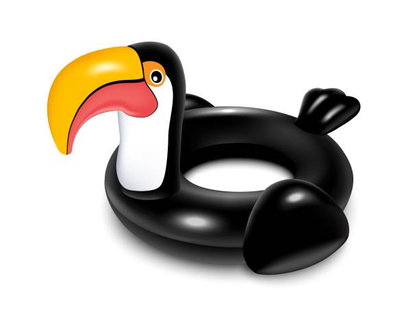 Rubber toucan black toy realistic vector eps10 Rubber ring for swimming in the pool. Black toucan bird. Water safety for children. Lifebuoy. Isolated on white background Realistic vector illustration. rainbow toucan stock illustrations