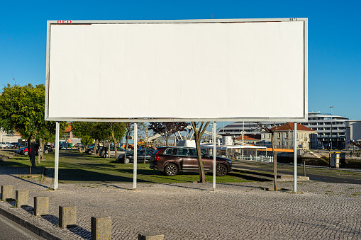 large blank and empty publicity panel in a public street in the city of Lisbon.