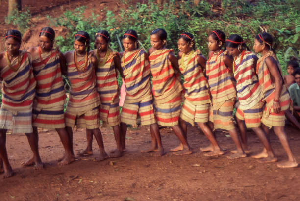 Orissa, Odisha, India - aug 23, 1996:  young Gonda woman perform a traditional ritual dance.    Photo from historical archive slide.