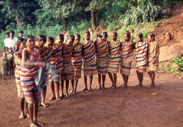 Orissa, Odisha, India - aug 23, 1996:  young Gonda woman perform a traditional ritual dance.    Photo from historical archive slide.