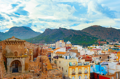 Cityscape with mountains and colorful houses in backround, Cartagena, Spain