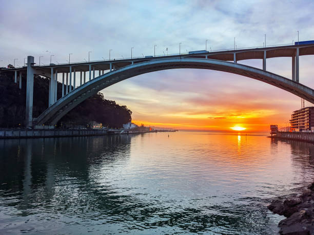 istock Arrabida bridge sunset Porto Portugal 1393019194