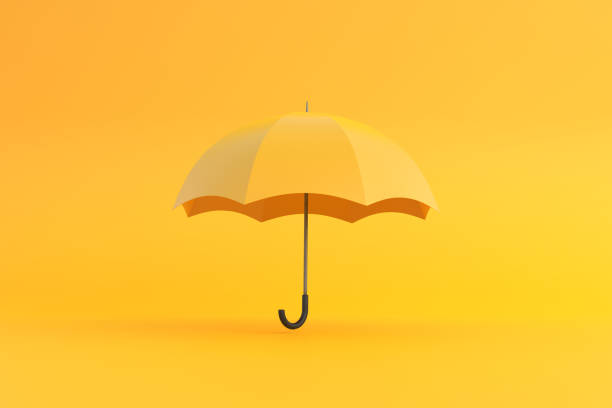 istock Yellow umbrella on a yellow background 1393019369