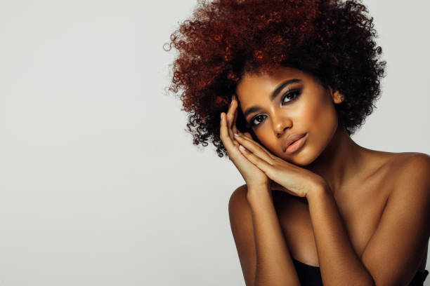 istock Beautiful afro woman with perfect make-up 1393020421