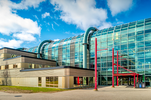 Davis Centre Library on the University of Waterloo campus in Waterloo, Ontario, Canada on a sunny day.