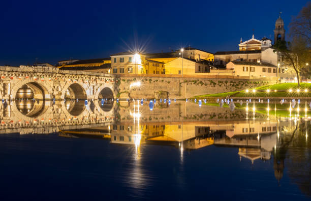 istock View of the Tiberius Bridge  (Ponte di Tiberio) in Rimini,  Emilia-Romagna, Italy - Blue Hour. 1393030249